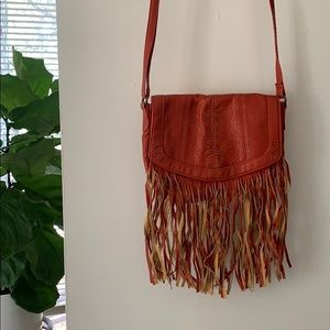 Red fringe leather crossbody